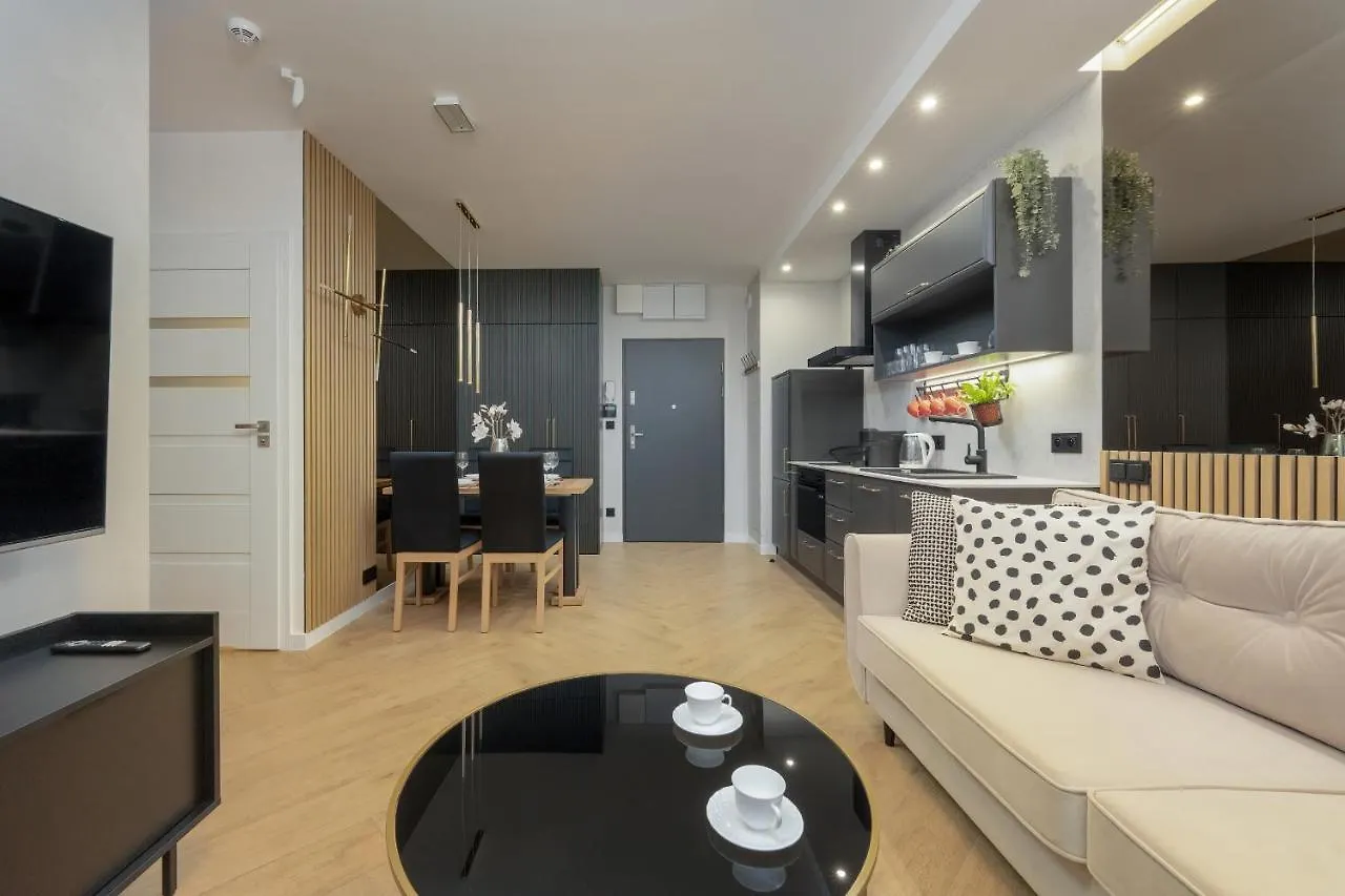 Black And Beige Apartment With Balcony And Parking In Wroclaw By Noclegi Renters